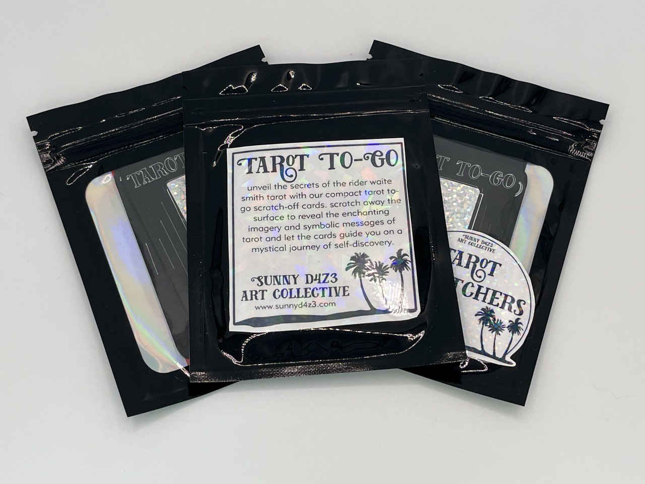 back of tarot to go package shown on top of the front of others